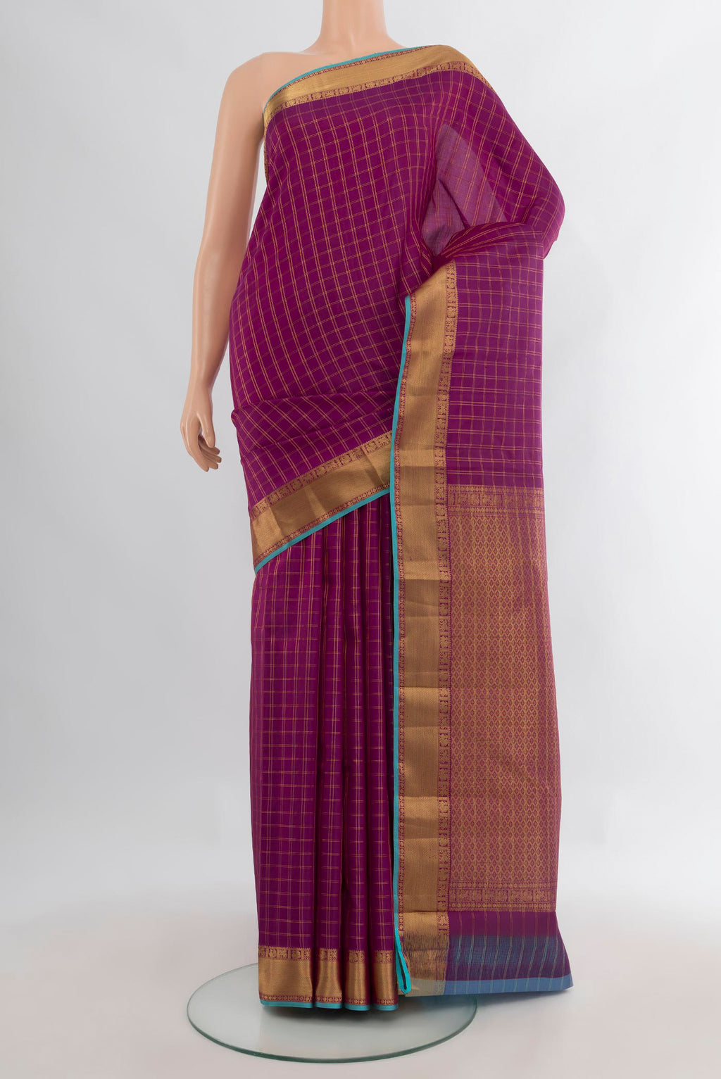 Pure Silk Magenta Kanchipuram Saree with Checked design on the body and Zari Border.  displayed on a mannequin