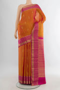 Pure Silk Mustard Kanchipuram Saree with Zari Butta on the body and Zari Border.  displayed on a mannequin