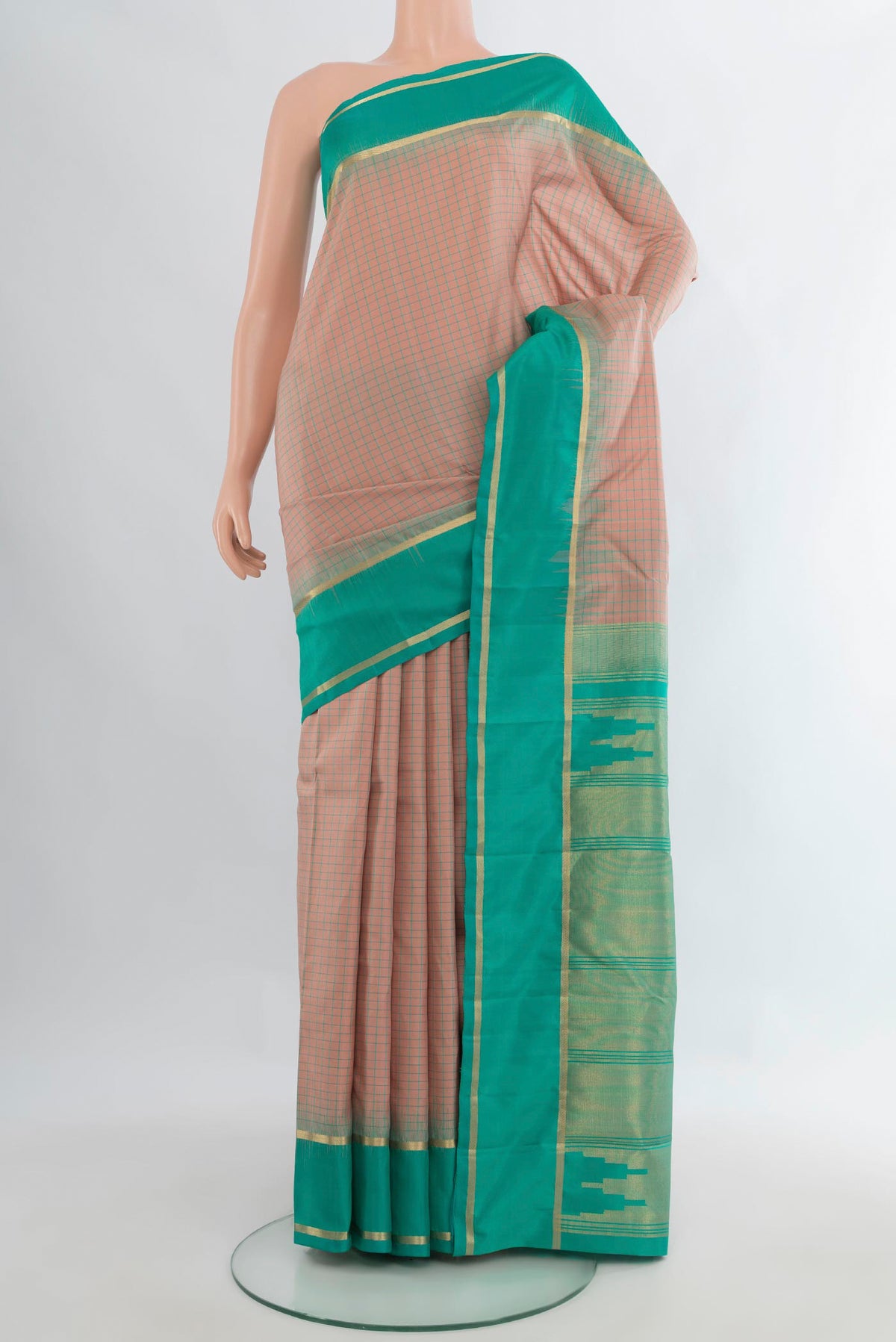 Pure Silk Beige Kanchipuram Saree with Checked design on the body and Plain Border.  displayed on a mannequin