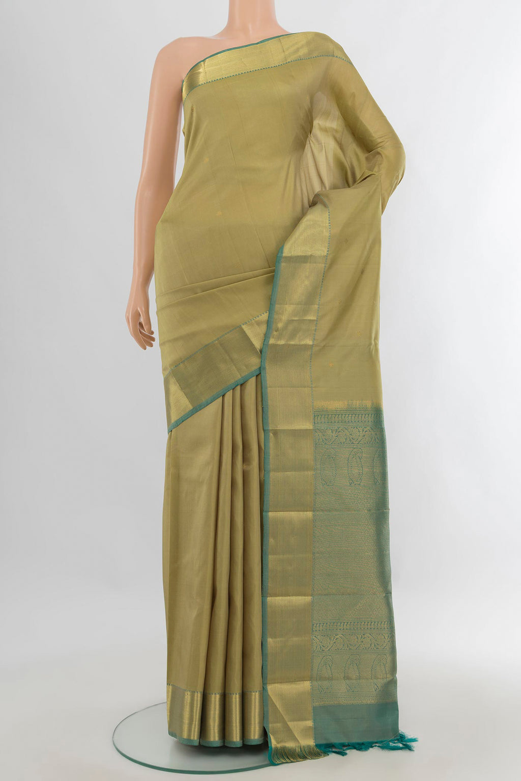 Pure Silk Olive Green Kanchipuram Saree with Zari Butta on the body and Zari Border.  displayed on a mannequin