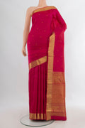 Pure Silk Dark Pink Kanjivaram Saree with Zari Butta on the body and Zari Border.  displayed on a mannequin