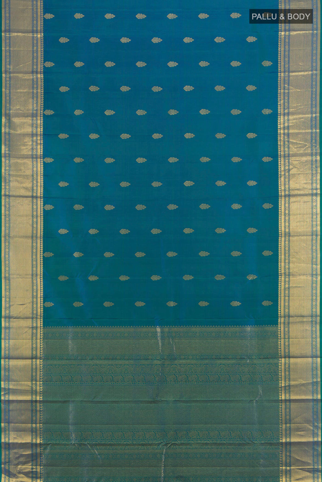 Flat view of Pure Silk Peacock Blue Kanjivaram Saree with Zari Butta on the body and Silk Border. 