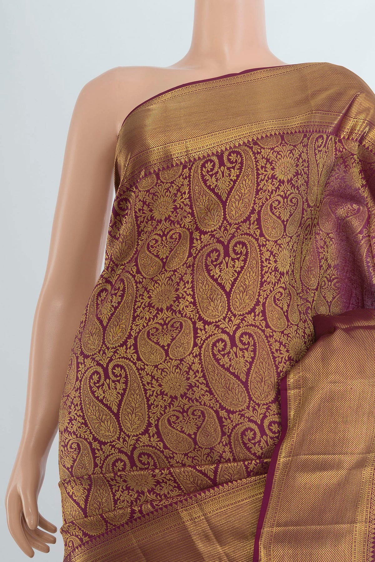 Border image of Pure Silk Maroon Kanchipuram Saree with Zari Butta on the body and Silk Border. 
