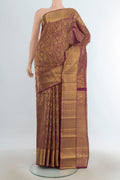 Pure Silk Maroon Kanchipuram Saree with Zari Butta on the body and Silk Border.  displayed on a mannequin