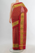 Pure Silk Red Rajkot Patola Saree with Pure Ikat on the body and Ikat Border.  displayed on a mannequin