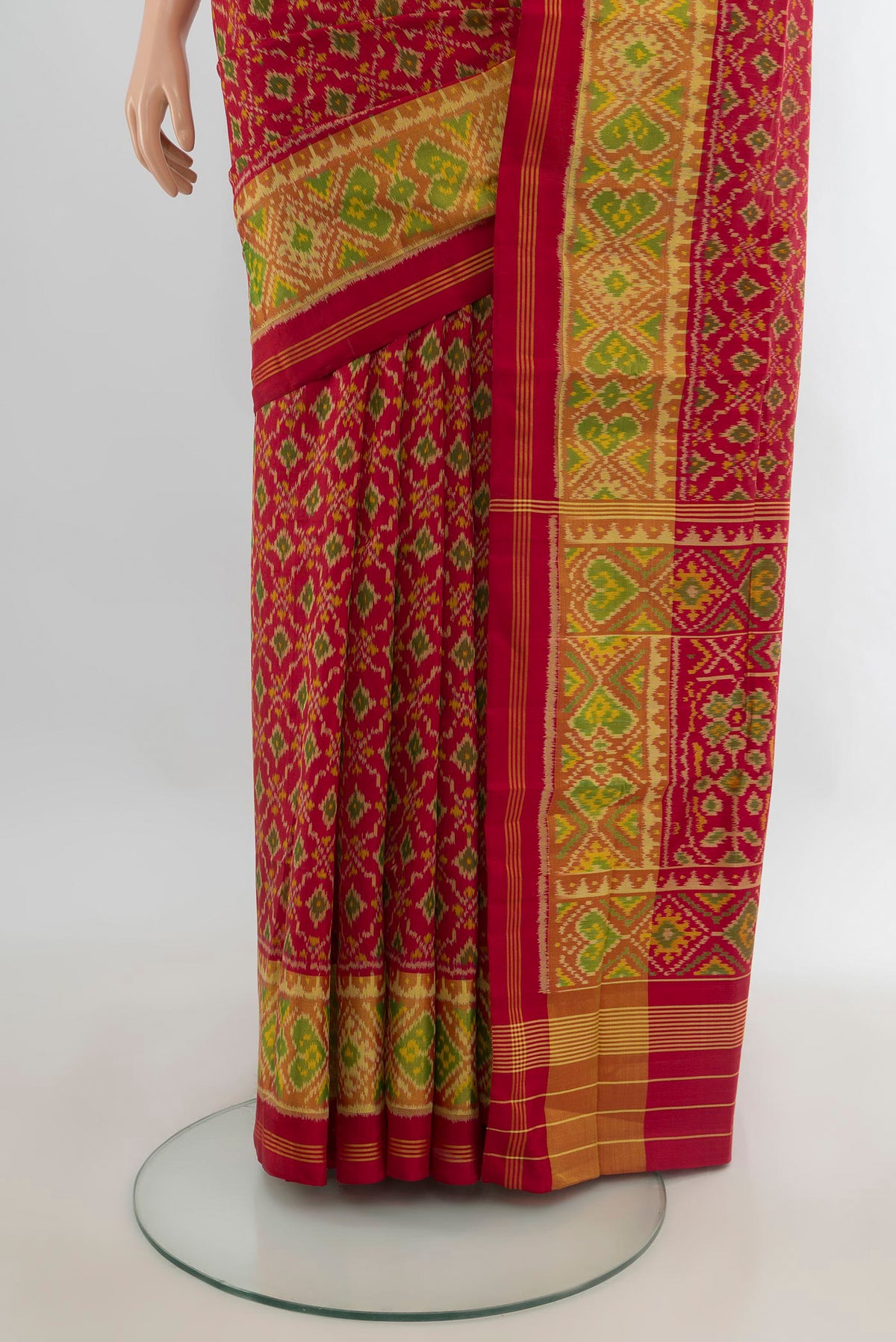 Pleats and pallu of Pure Silk Red Rajkot Patola Saree with Pure Ikat on the body and Ikat Border. 