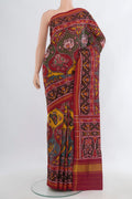 Pure Silk Multi Color Rajkot Patola Saree with Pure Ikat on the body and Ikat Border.  displayed on a mannequin