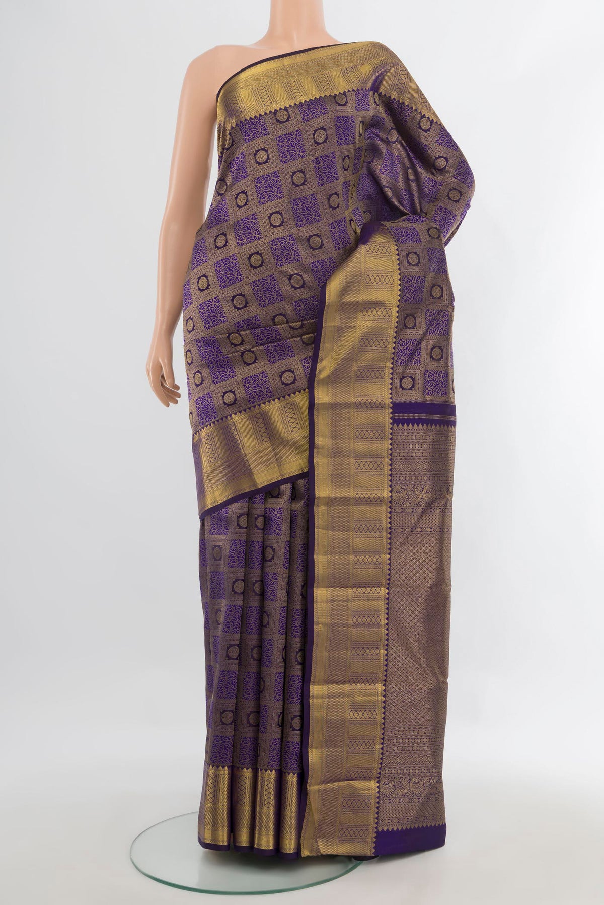 Pure Silk Violet Kanchipuram Saree with Zari Brocade on the body and Zari Border.  displayed on a mannequin