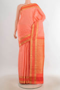 Pure Silk Rose Gold Kanchipuram Saree with Zari Butta on the body and Silk Border.  displayed on a mannequin