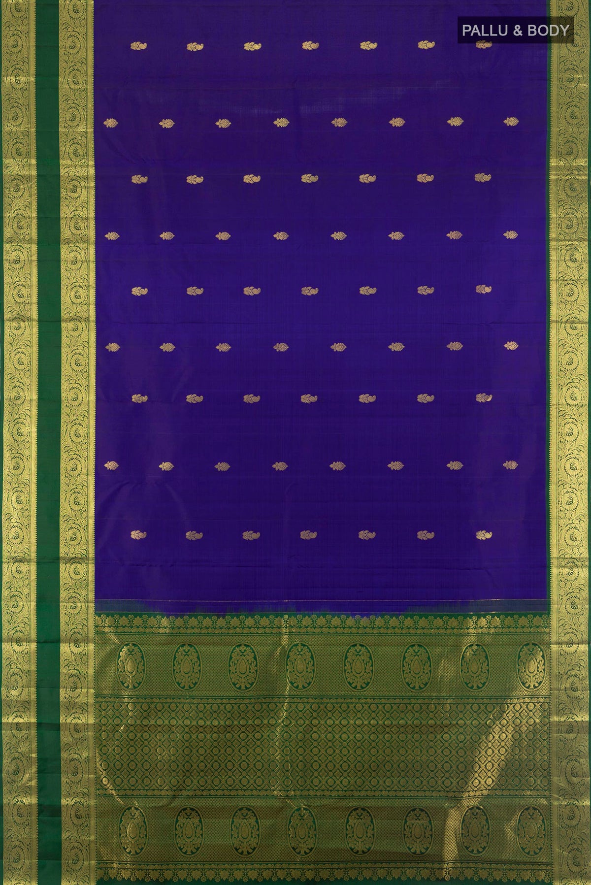 Flat view of Pure Silk Dark Blue Kanchipuram Saree with Zari Butta on the body and Zari Border. 