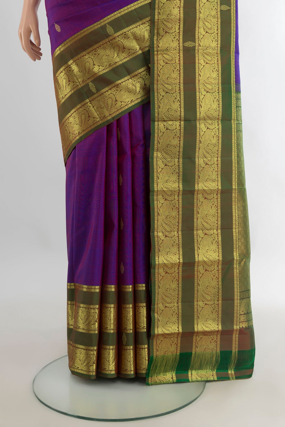 Pleats and pallu of Pure Silk Purple Kanchipuram Saree with Zari Butta on the body and Zari Border. 
