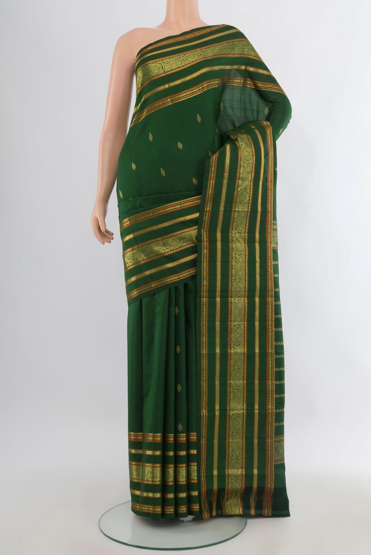 Pure Silk Green Kanchipuram Saree with Zari Butta on the body and Zari Border.  displayed on a mannequin