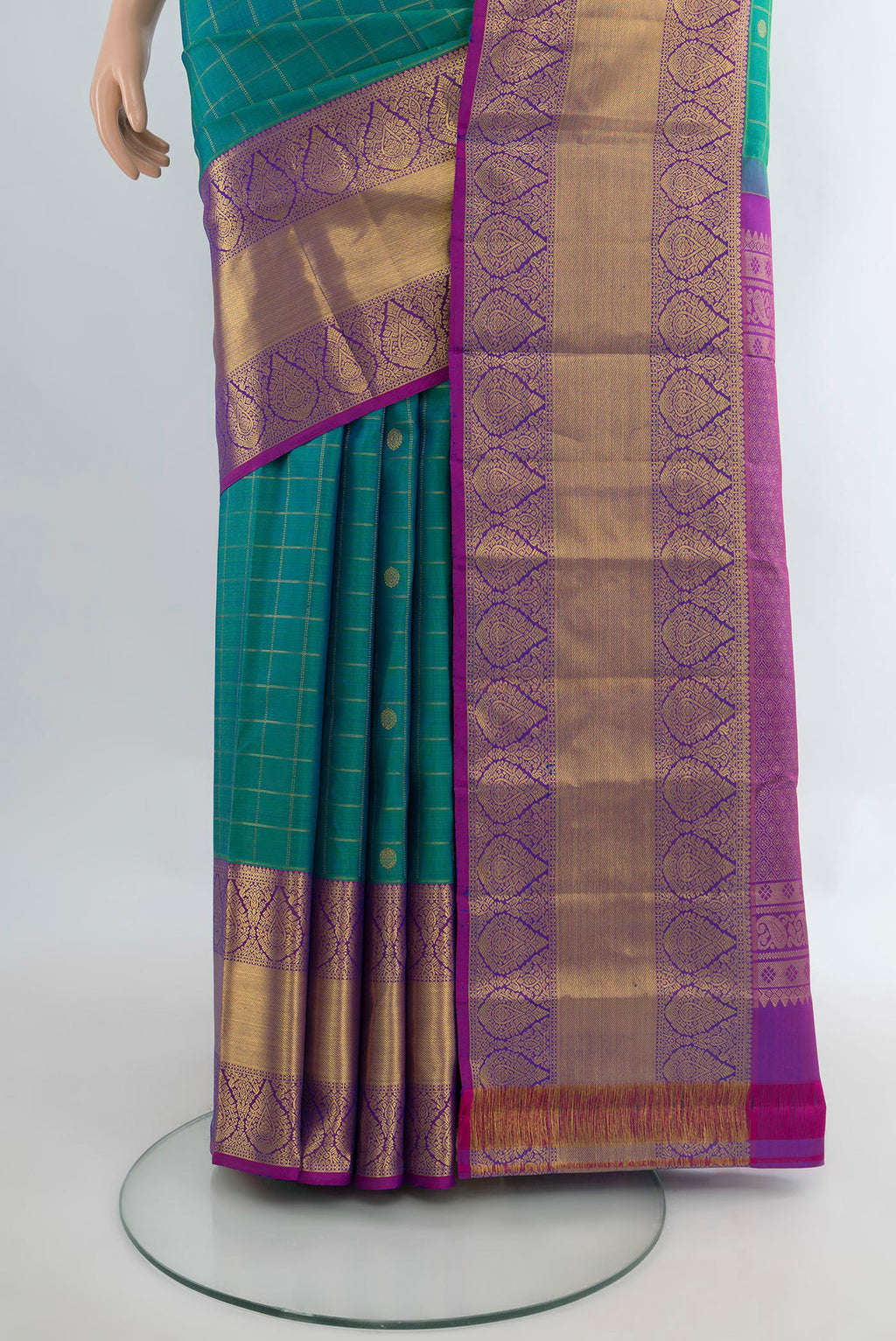Pleats and pallu of Pure Silk Peacock Blue Dual Tone Kanjivaram Saree with Checked design on the body and Zari Border. 