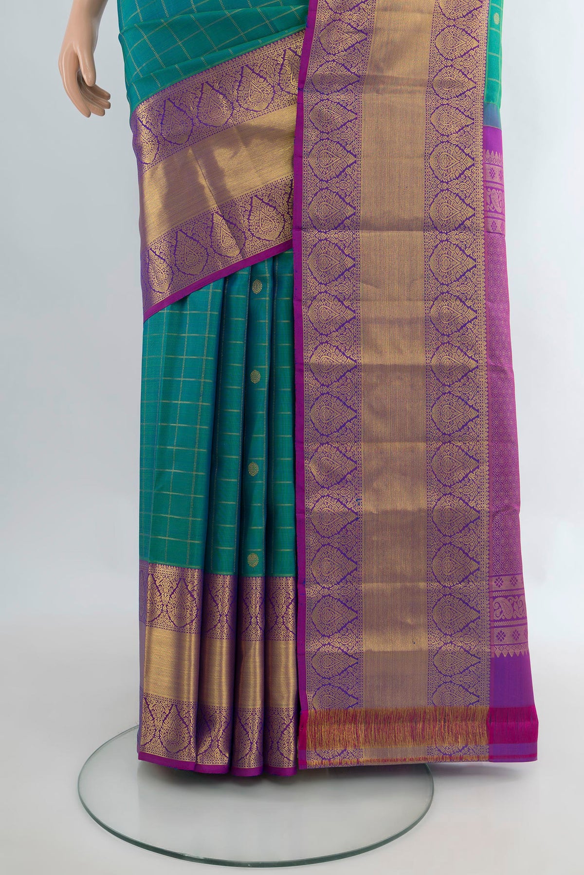 Pleats and pallu of Pure Silk Peacock Blue Dual Tone Kanjivaram Saree with Checked design on the body and Zari Border. 