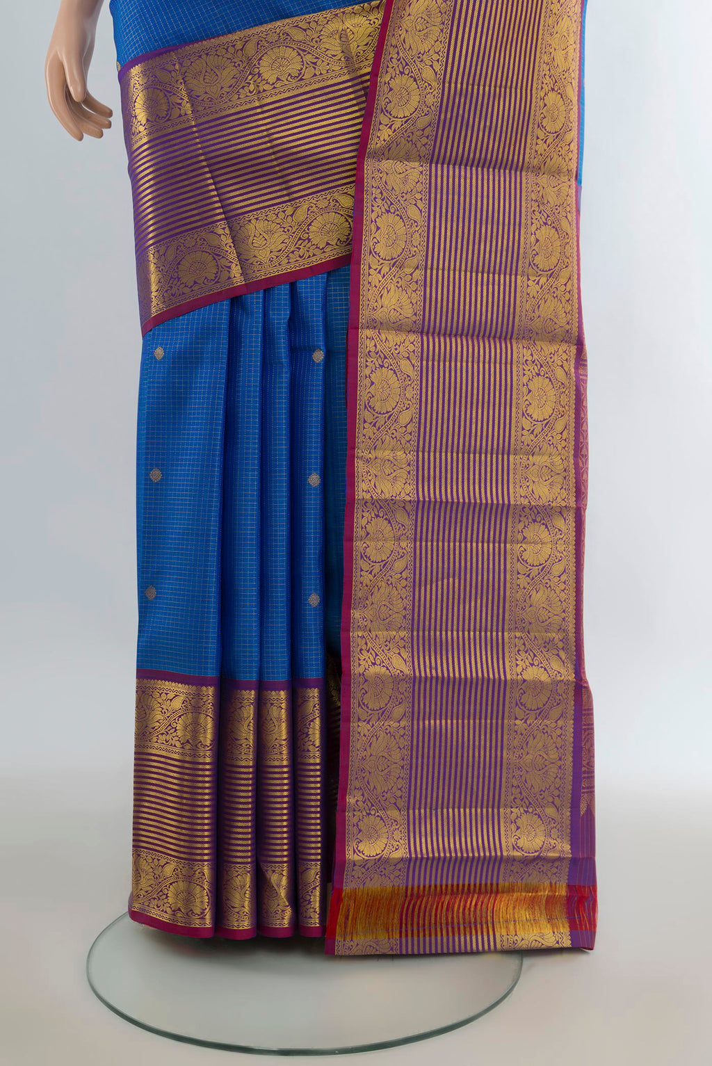 Pleats and pallu of Pure Silk Royal Blue Kanjivaram Saree with Zari Butta on the body and Zari Border. 