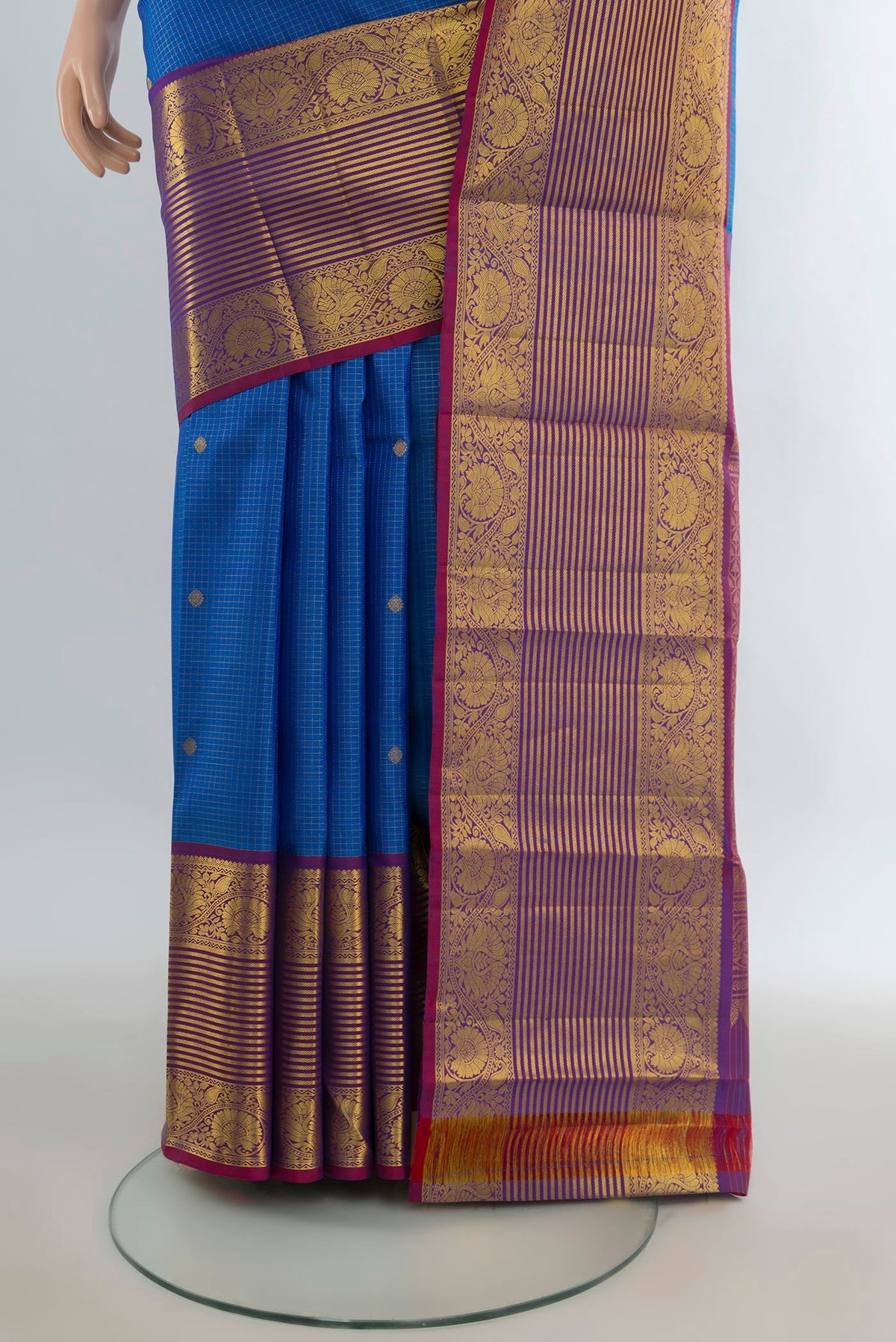 Pleats and pallu of Pure Silk Royal Blue Kanjivaram Saree with Zari Butta on the body and Zari Border. 