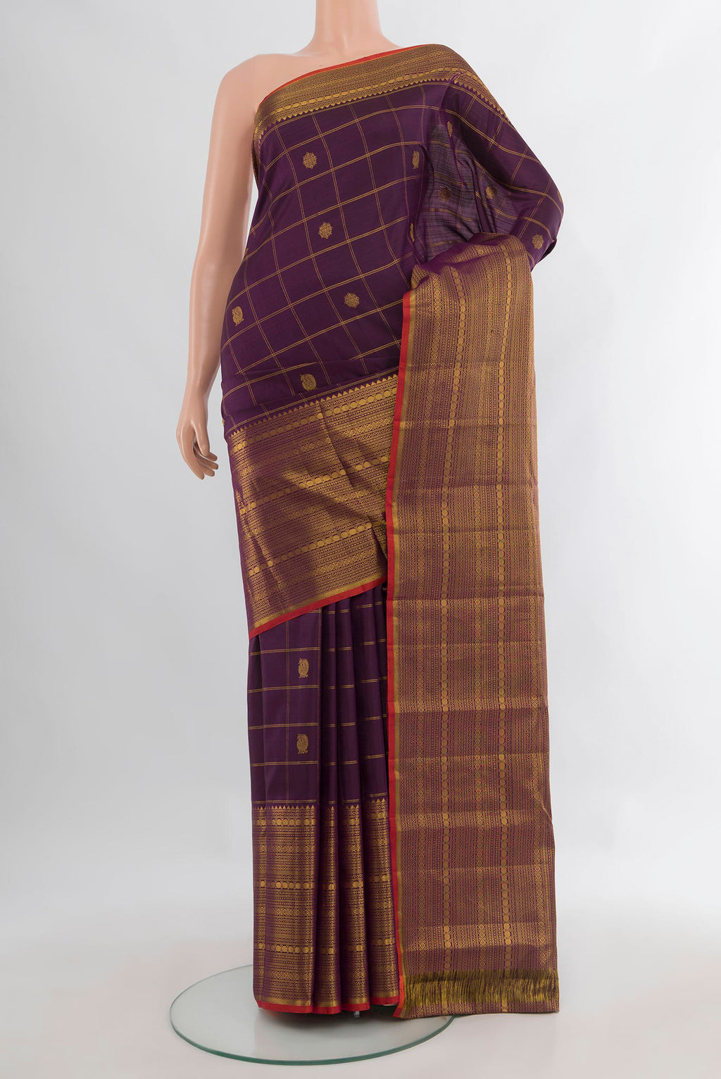 Pure Silk Purple Kanjivaram Saree with Checked design on the body and Zari Border.  displayed on a mannequin