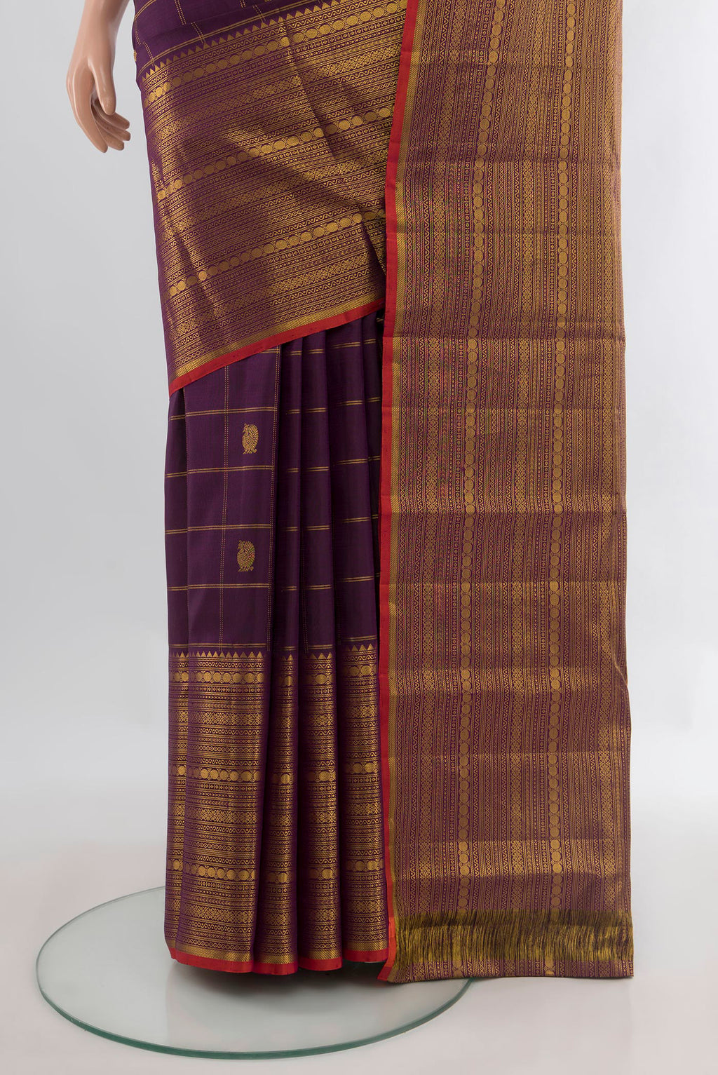Pleats and pallu of Pure Silk Purple Kanjivaram Saree with Checked design on the body and Zari Border. 