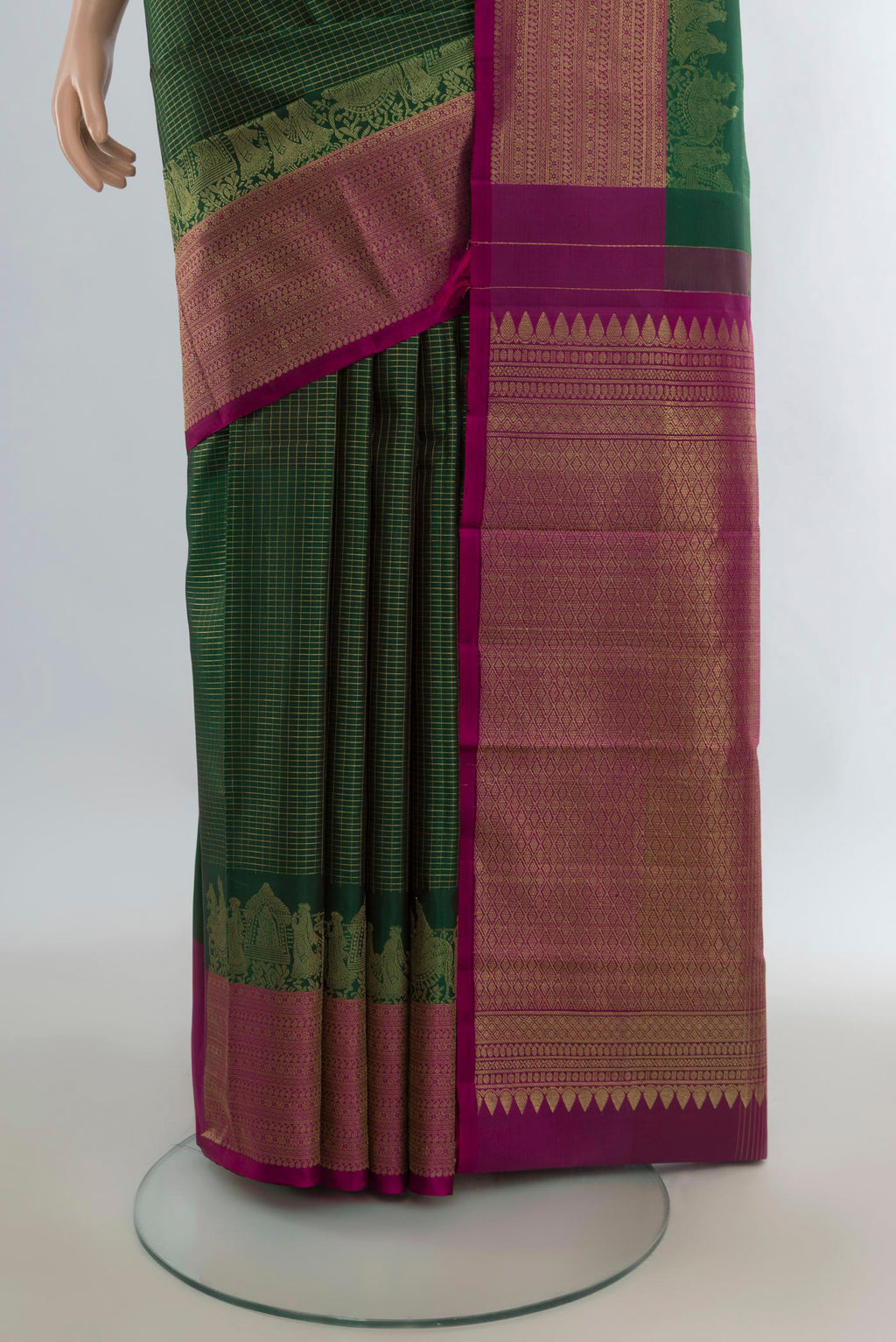 Pleats and pallu of Pure Silk Green Kanjivaram Saree with Checked design on the body and Fancy Border. 