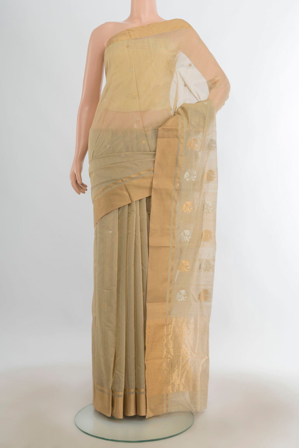 Sandal Chanderi Cotton Saree with Zari Butta on the body and Silk Border.  displayed on a mannequin