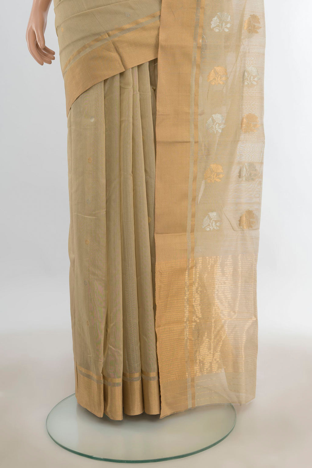 Pleats and pallu of Sandal Chanderi Cotton Saree with Zari Butta on the body and Silk Border. 