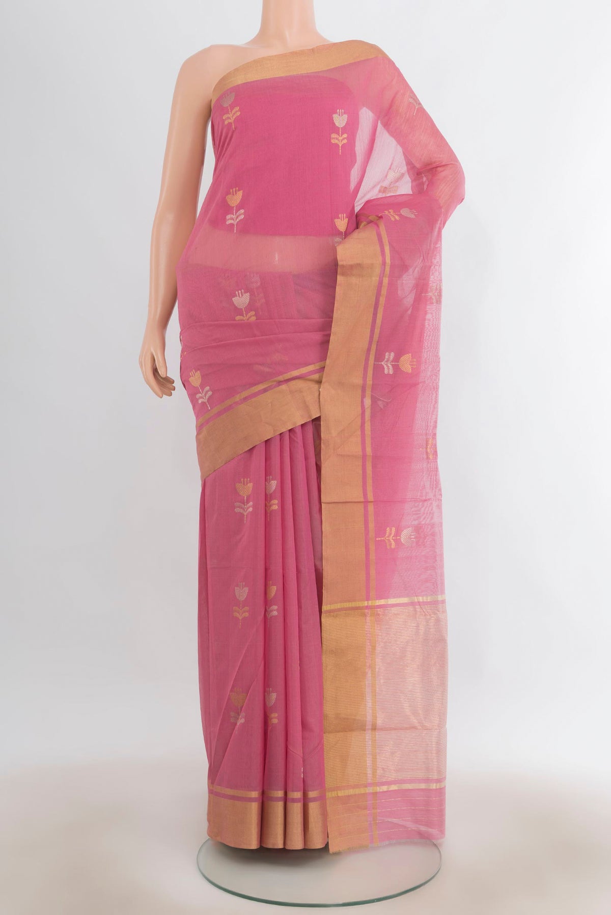 Rose pink Chanderi Cotton Saree with Zari Butta on the body and Zari Border.  displayed on a mannequin