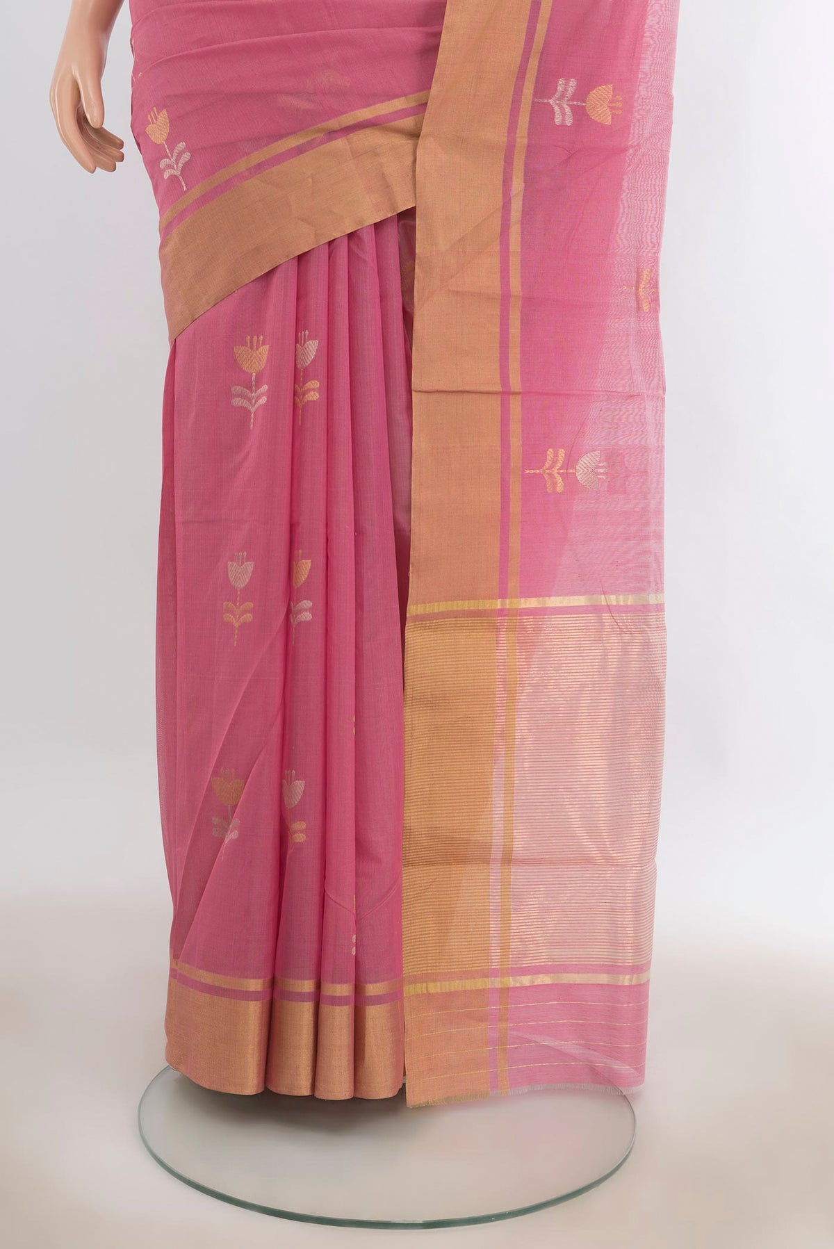 Pleats and pallu of Rose pink Chanderi Cotton Saree with Zari Butta on the body and Zari Border. 