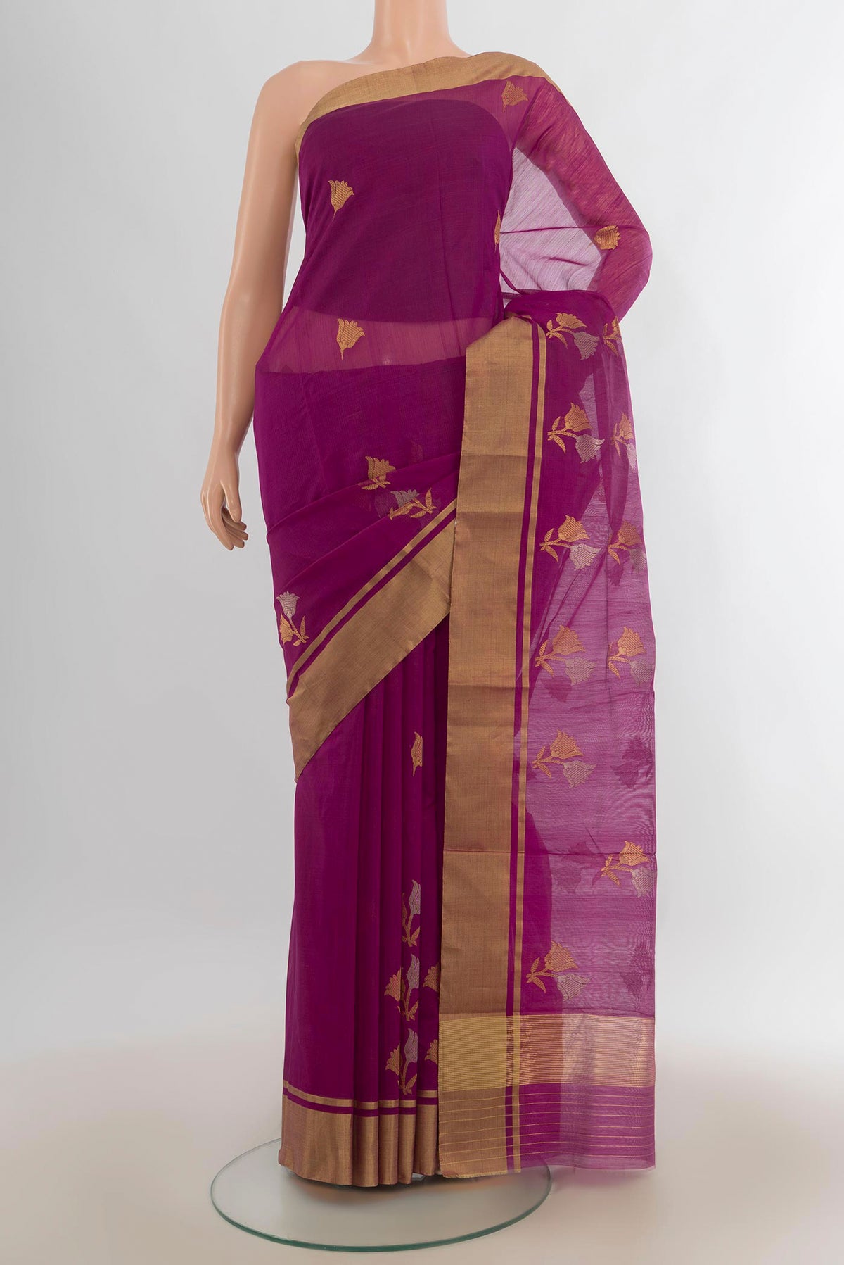Magenta Chanderi Cotton Saree with Zari Butta on the body and Zari Border.  displayed on a mannequin