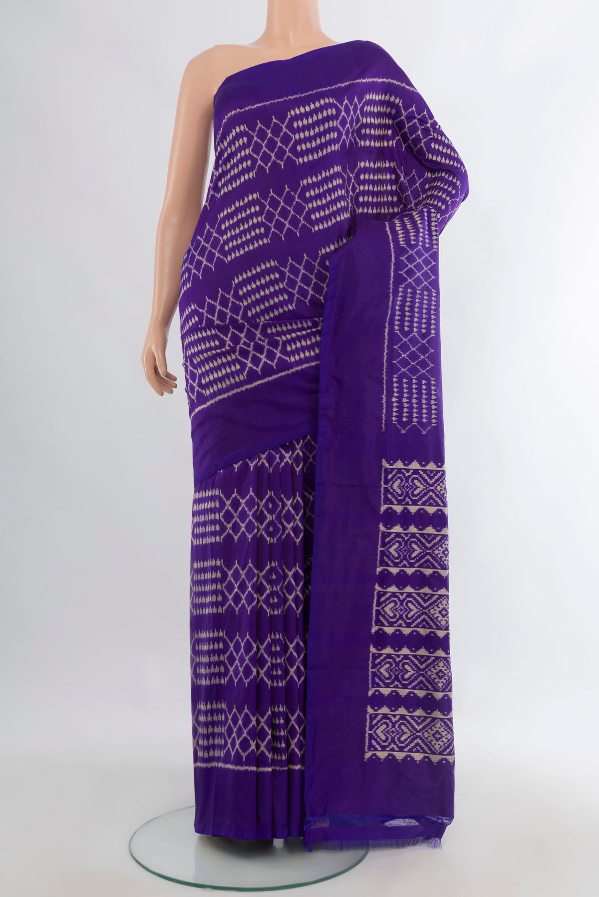 Pure Silk Violet Pochampally Saree with Pure Ikat on the body and Plain Border.  displayed on a mannequin
