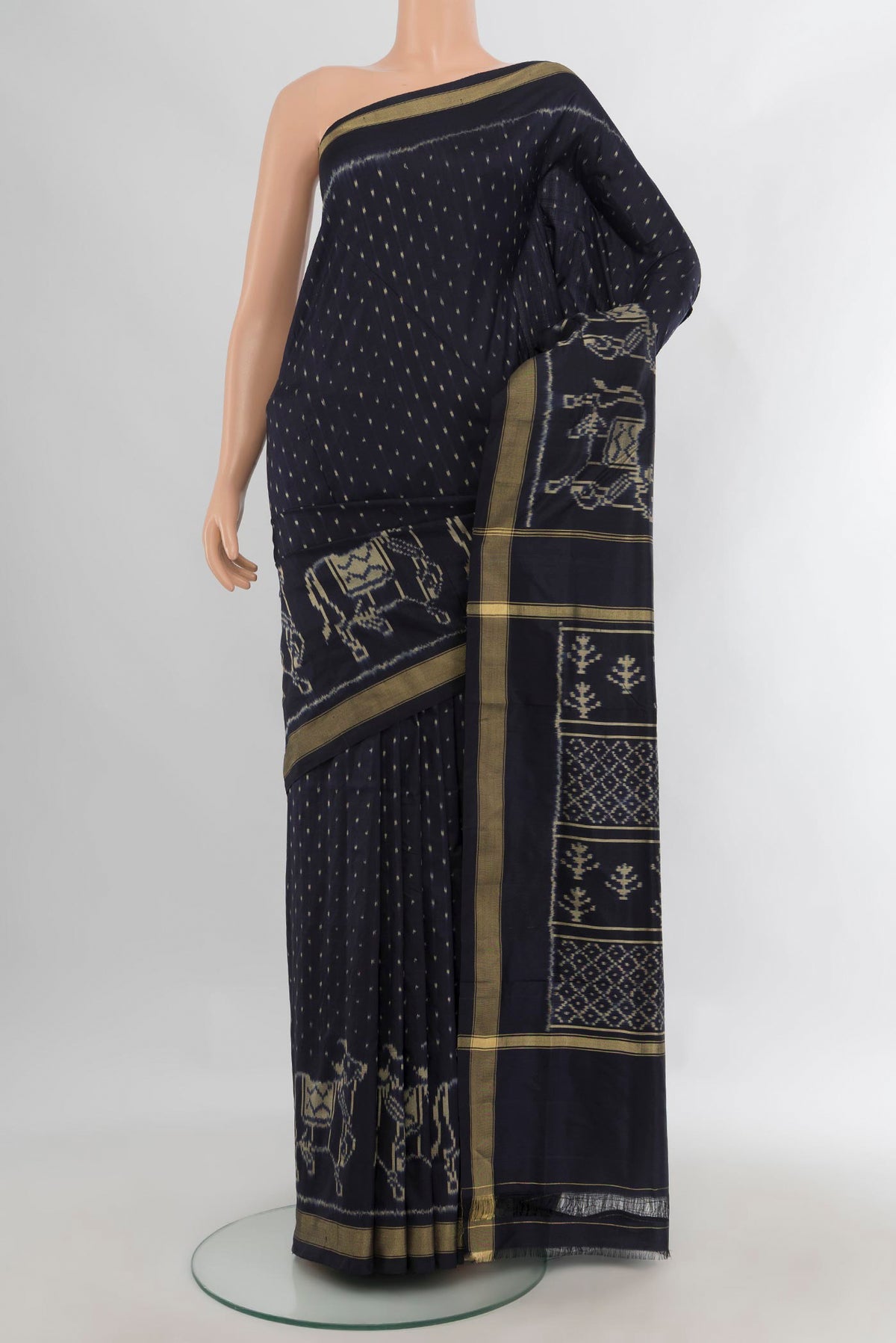 Pure Silk Navy Blue Pochampally Saree with Pure Ikat on the body and Zari Border.  displayed on a mannequin