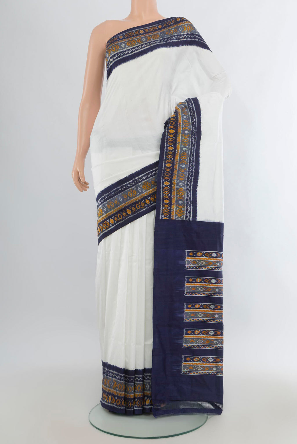 Pure Silk Off White Pochampally Saree with Plain Body and Ikat Border.  displayed on a mannequin