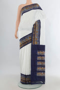 Pure Silk Off White Pochampally Saree with Plain Body and Ikat Border.  displayed on a mannequin
