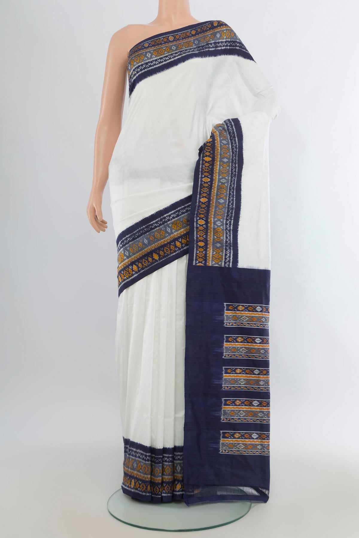 Pure Silk Off White Pochampally Saree with Plain Body and Ikat Border.  displayed on a mannequin