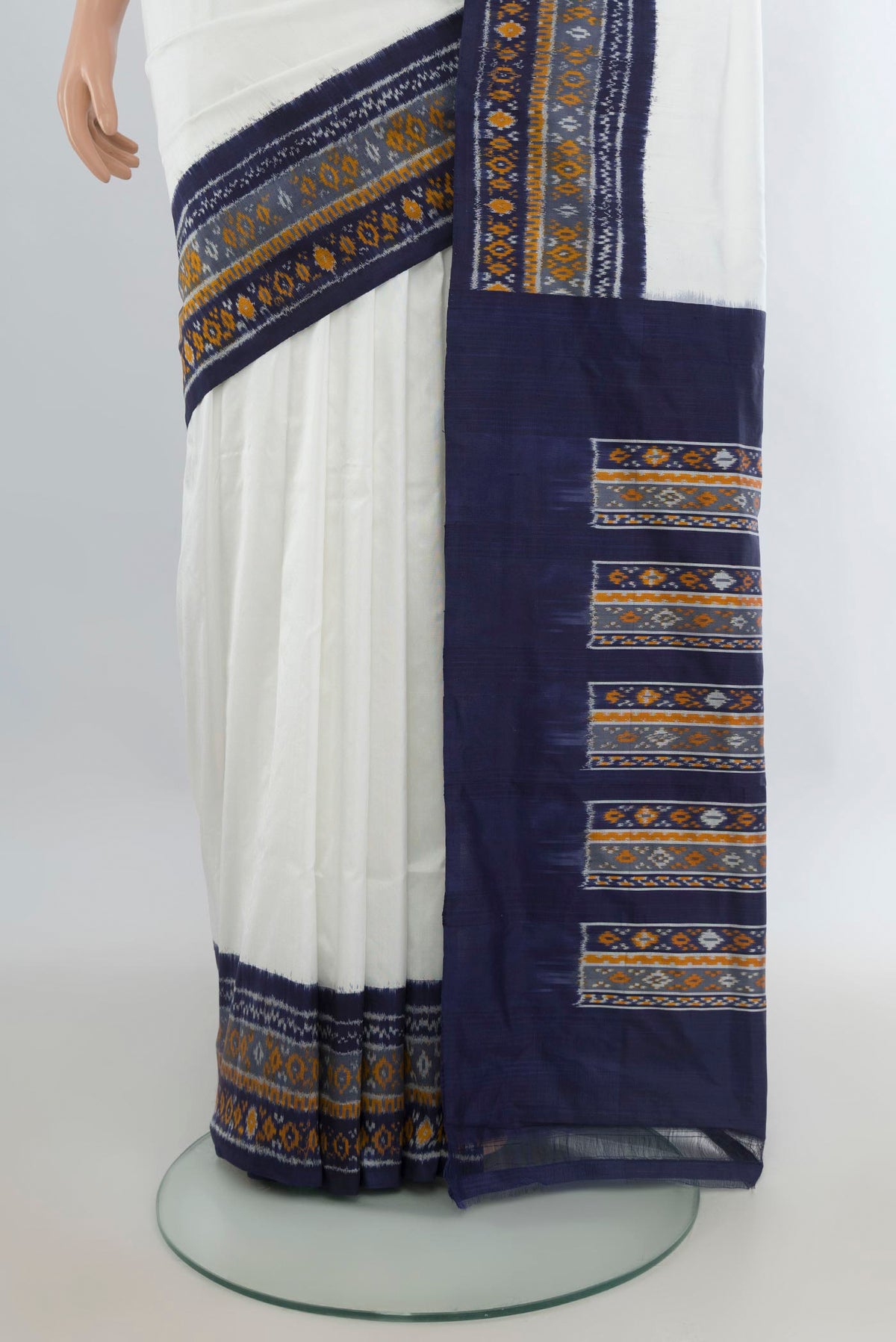 Pleats and pallu of Pure Silk Off White Pochampally Saree with Plain Body and Ikat Border. 