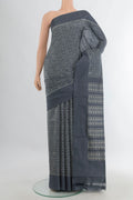 Pure Silk Davys Grey Pochampally Saree with Ikat Print on the body and Silk Border.  displayed on a mannequin