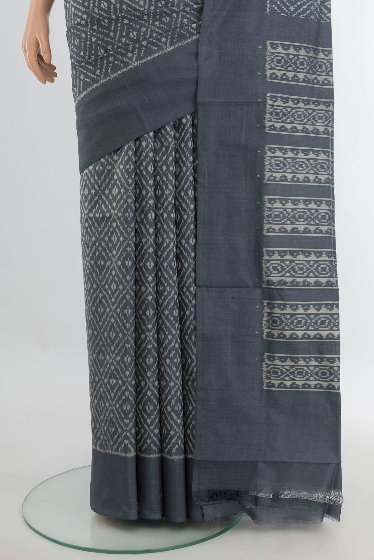 Pleats and pallu of Pure Silk Davys Grey Pochampally Saree with Ikat Print on the body and Silk Border. 