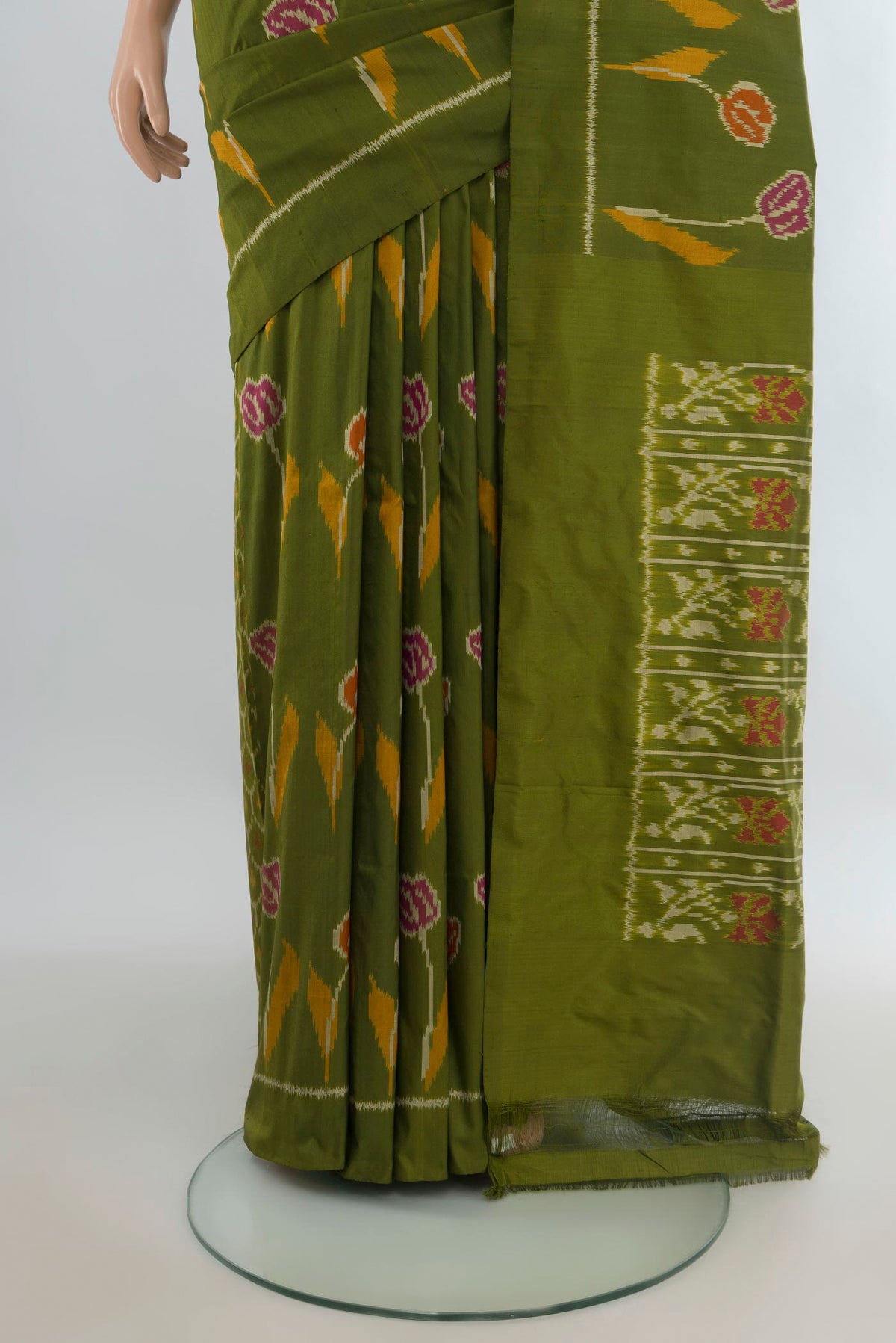 Pleats and pallu of Pure Silk Green Pochampally Saree with Pure Ikat on the body and Plain Border. 
