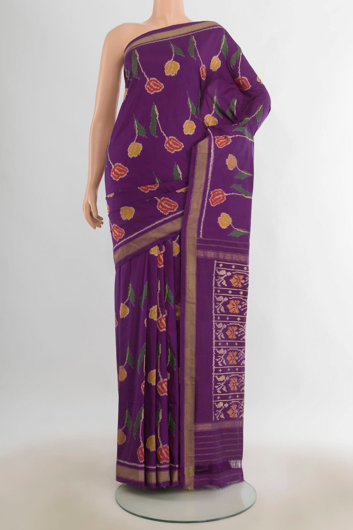 Pure Silk Multi Color Pochampally Saree with Ikat Print on the body and Silk Border.  displayed on a mannequin