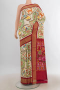 Pure Silk Acid Green Pochampally Saree with Pure Ikat on the body and Zari Border.  displayed on a mannequin
