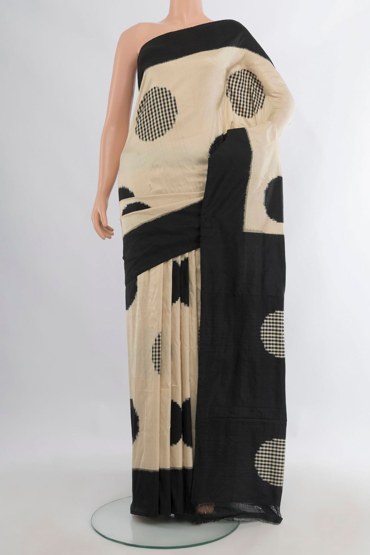 Pure Silk Sandal Pochampally Saree with Checked design on the body and Plain Border.  displayed on a mannequin