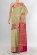 Pure Silk Beige Soft Saree with Zari Butta on the body and Zari Border.  displayed on a mannequin
