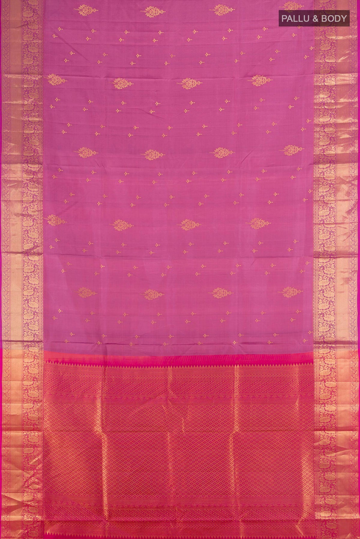 Flat view of Pure Silk Mauve Soft Saree with Zari Butta on the body and Zari Border. 