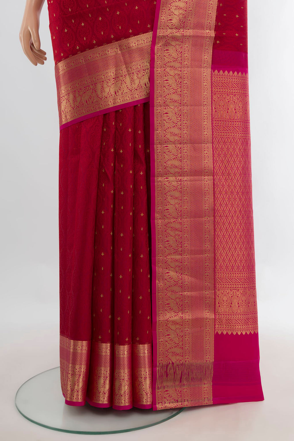 Pleats and pallu of Pure Silk Red Soft Saree with Jacquard With Zari Butta on the body and Zari Border. 
