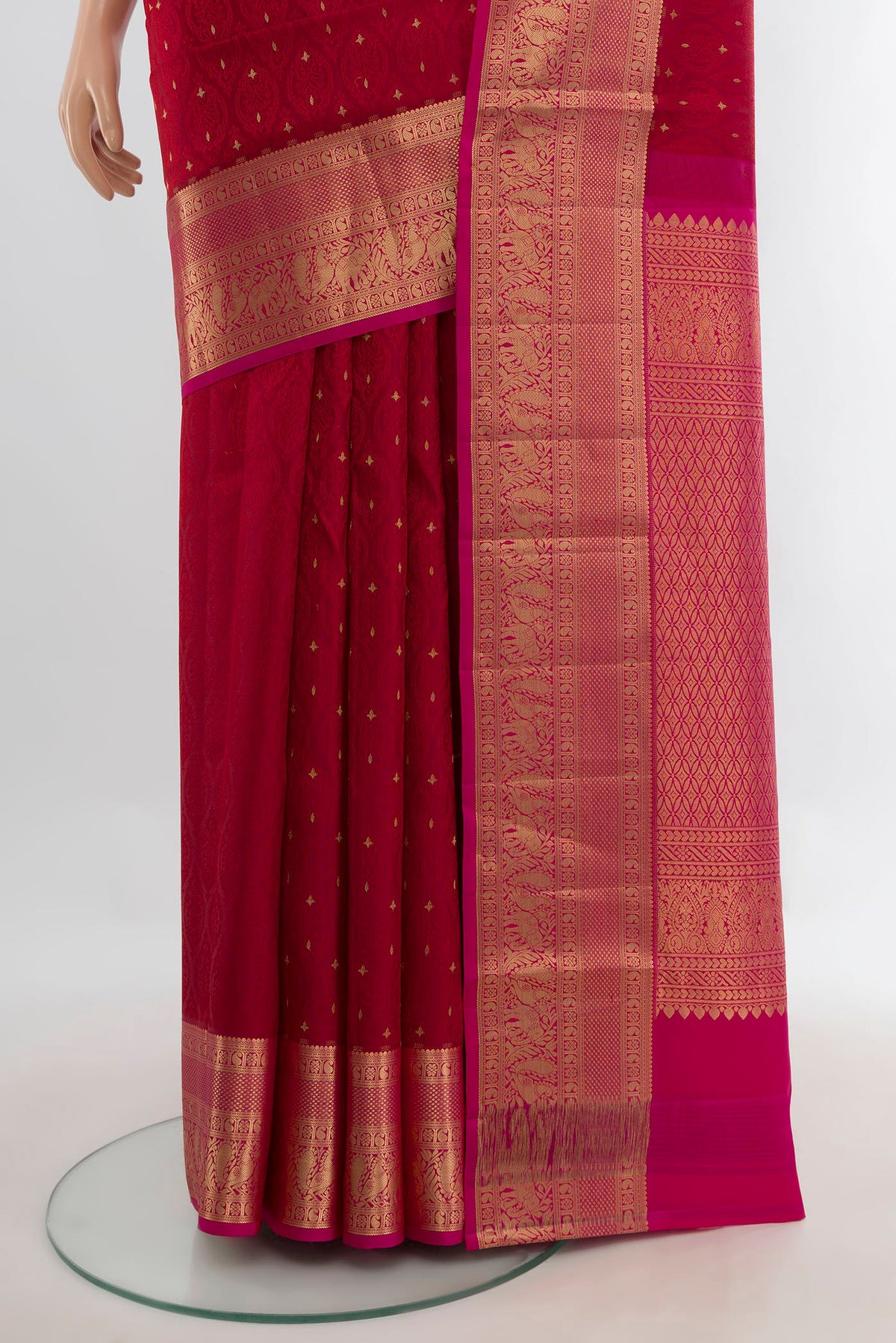 Pleats and pallu of Pure Silk Red Soft Saree with Jacquard With Zari Butta on the body and Zari Border. 