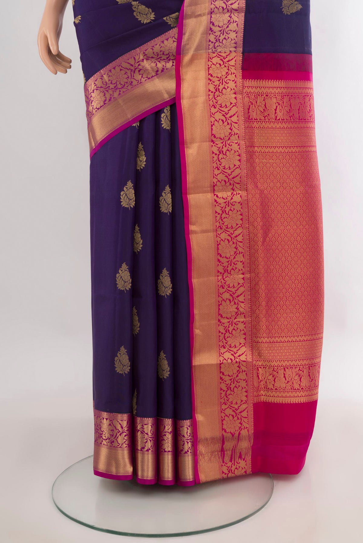 Pleats and pallu of Pure Silk Navy Blue Soft Saree with Zari Butta on the body and Zari Border. 