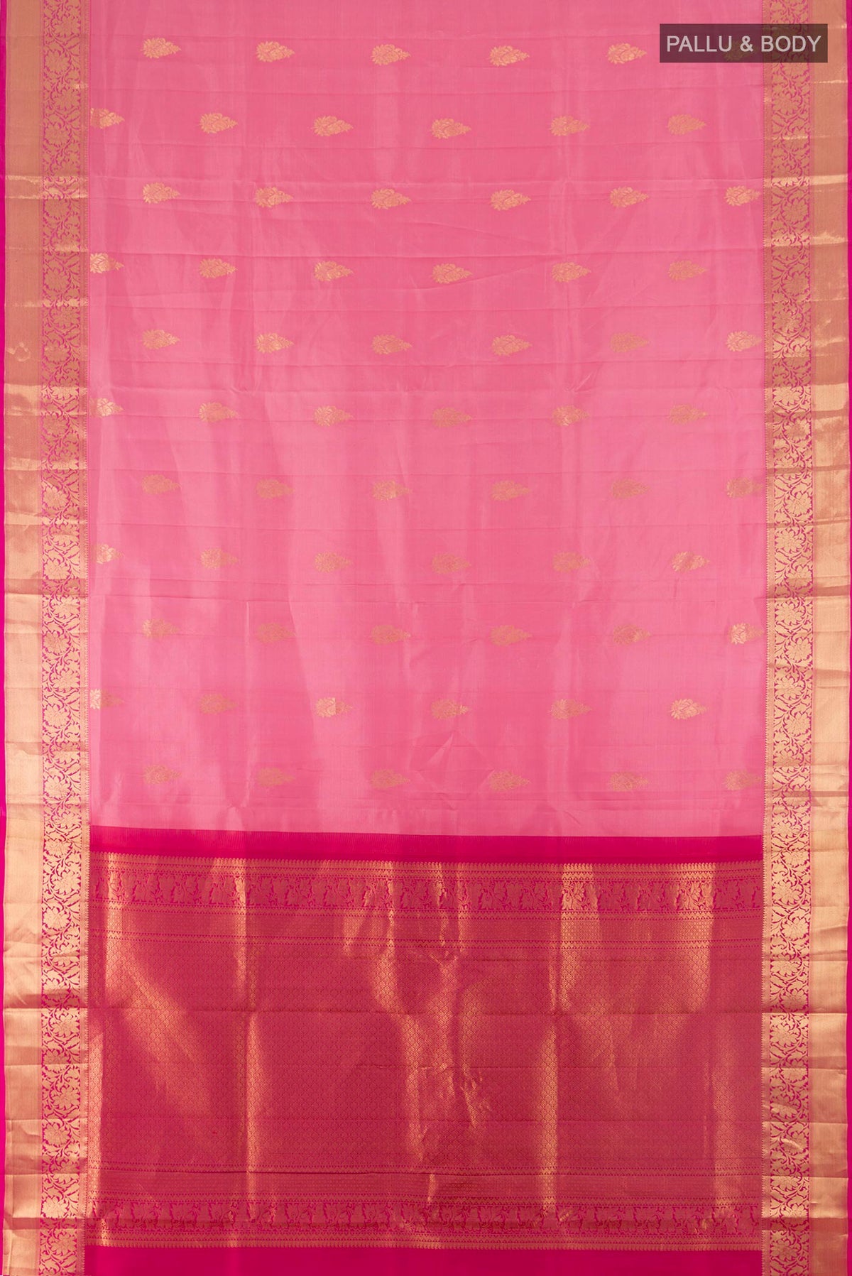 Flat view of Pure Silk Rose pink Soft Saree with Zari Butta on the body and Zari Border. 