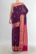 Pure Silk Purple Soft Saree with Zari Butta on the body and Silk Border.  displayed on a mannequin