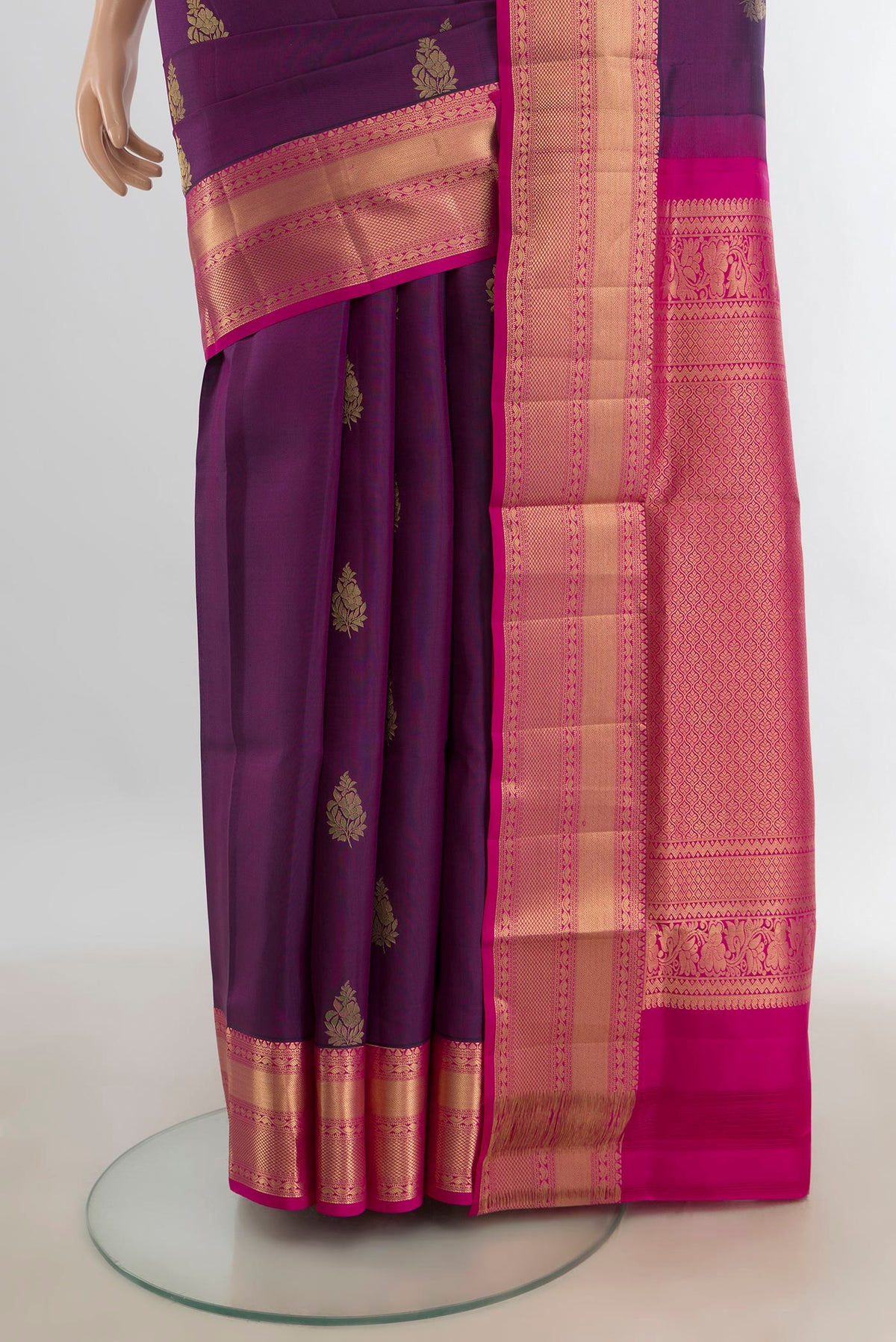 Pleats and pallu of Pure Silk Purple Soft Saree with Zari Butta on the body and Silk Border. 