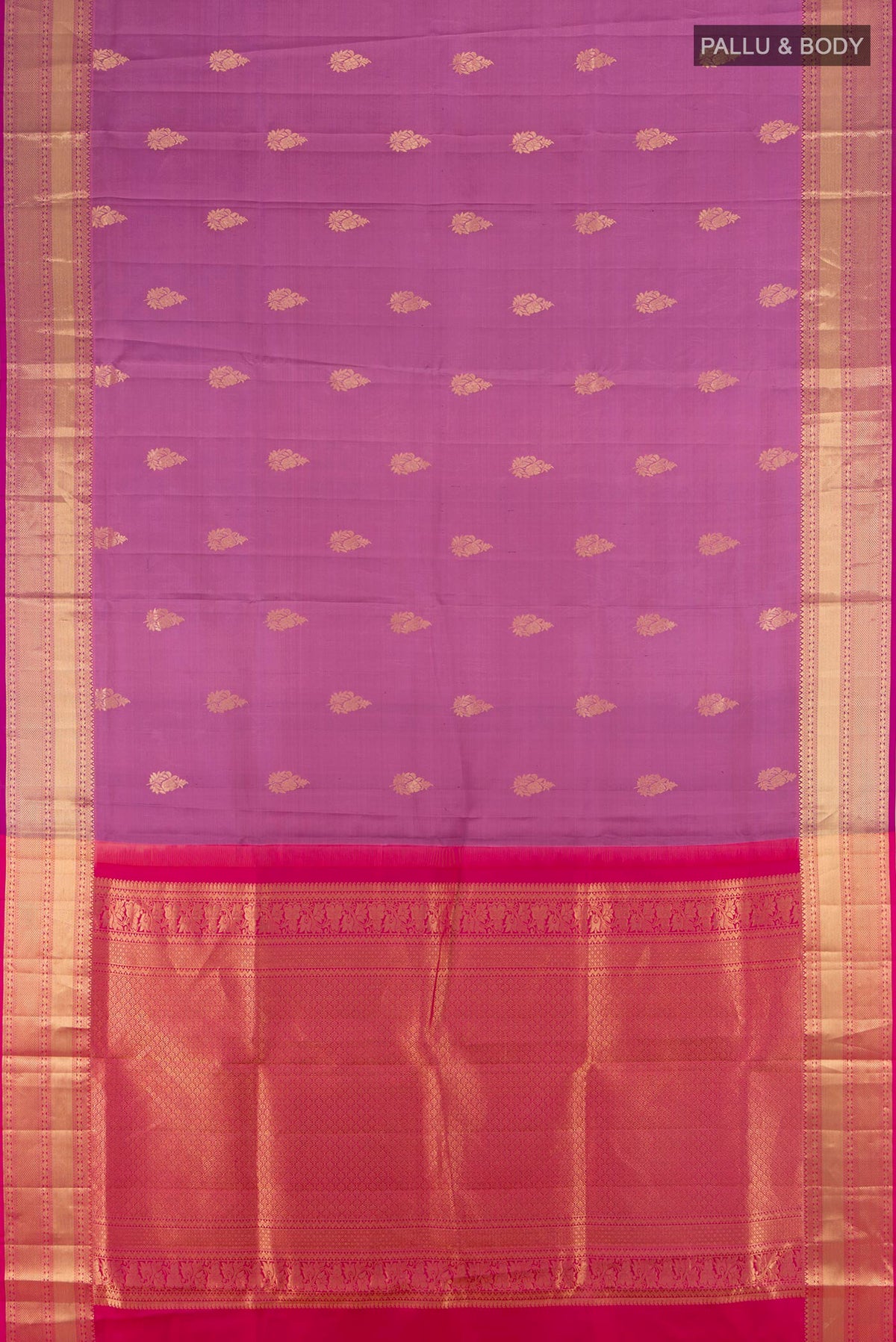 Flat view of Pure Silk Lavender Soft Saree with Zari Butta on the body and Zari Border. 
