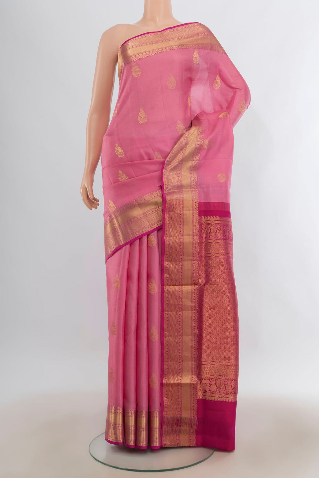 Pure Silk Rose pink Soft Saree with Zari Butta on the body and Zari Border.  displayed on a mannequin